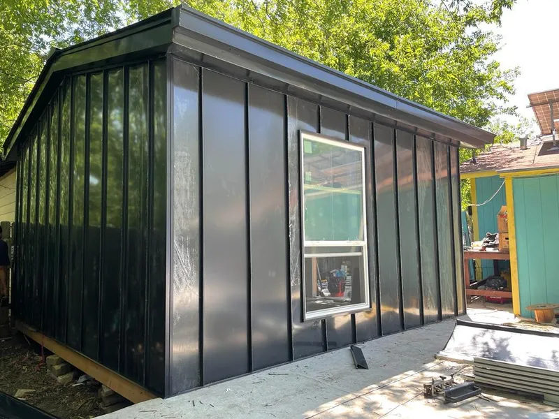 Black standing seam metal wall panels for Metal Roof Installation in Mayfield